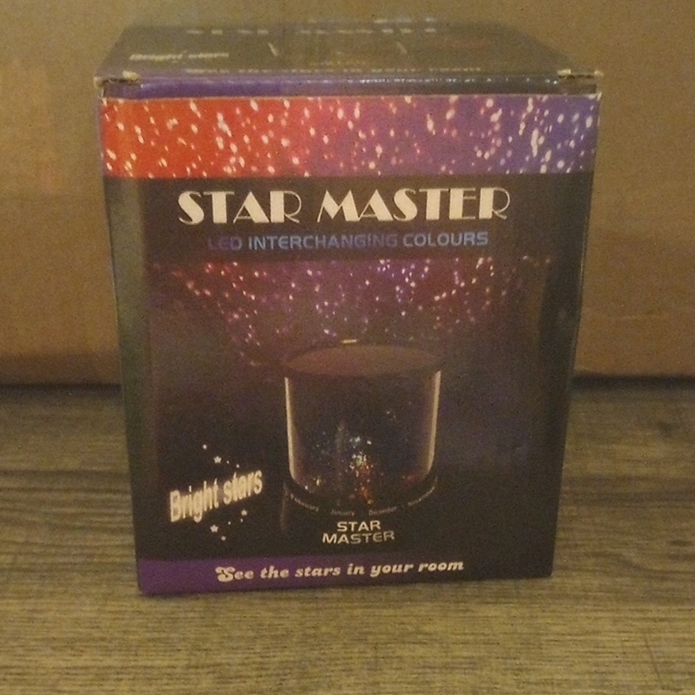 Black and Purple Cosmic Projector